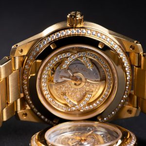 Gucci 18K Gold Automatic Watch with Diamond Bezel